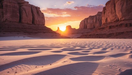 Sunset in a desert canyon with sand dunes and red rock formations. Scenic natural landscape. Beautiful evening sky and tranquil desert environment.