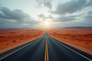 Naklejka premium Endless Desert Road at Sunrise