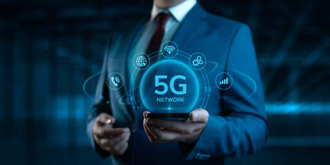Businessman Holding Smartphone with 5G Network Icons on Screen. Business and Technology concept