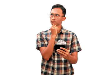 An Asian man holding a wallet full of money with a thinking expression
