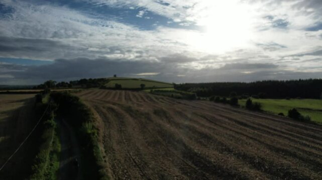 Drone view of Radnage Valley in Buckinghamshire, England, with patchwork fields, rolling hills