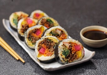 Kimbap or also known as gimbap is a typical Korean rice roll