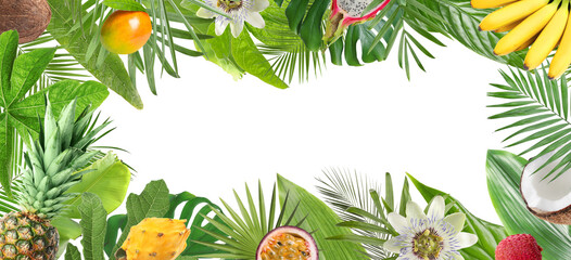 Frame made of fresh tropical fruits, flowers and green leaves on white background