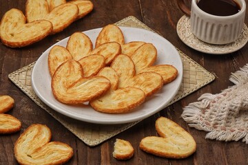 Palmier is a classic French cookie. The heart-shaped cookie is crispy and very rich in aroma and delicious buttery flavor.