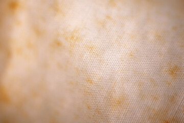 Brown stain appear on white stored cloth due to poorly ventilation