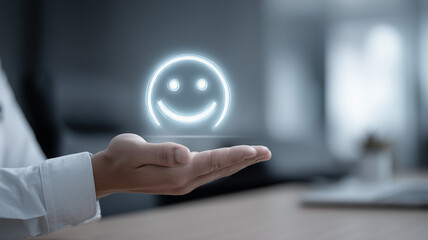 A business hand presents a hovering neon smile icon, symbolising exceptional customer satisfaction and positive digital user experience.
