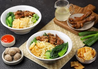 Mie Ayam. Chicken noodles are a typical Indonesian dish made from wheat noodles seasoned with pieces of chicken meat.