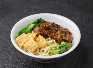 Mie Ayam. Chicken noodles are a typical Indonesian dish made from wheat noodles seasoned with pieces of chicken meat.