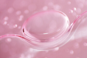Macro bubbles of face serum as background