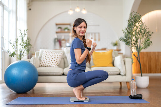 Woman tracking weight on digital scale, wellness and fitness progress monitoring, weight loss goals, body shape care, regular exercise, body mass index, bmi, self-care, healthy lifestyle - Powered by Adobe