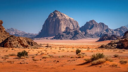 Vast desert landscape with dramatic mountains