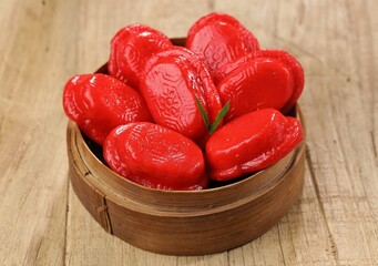 Kueku or Angku Kueh. Ku cake or tok cake or red turtle cake is a traditional small round or oval...