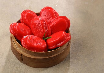 Kueku or Angku Kueh. Ku cake or tok cake or red turtle cake is a traditional small round or oval...
