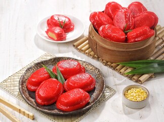 Kueku or Angku Kueh. Ku cake or tok cake or red turtle cake is a traditional small round or oval...