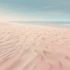 Sweeping beach scene pink sand dunes meet the sea under a pale blue sky