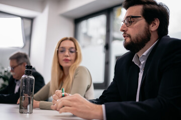 Group meeting with professionals in a modern office environment