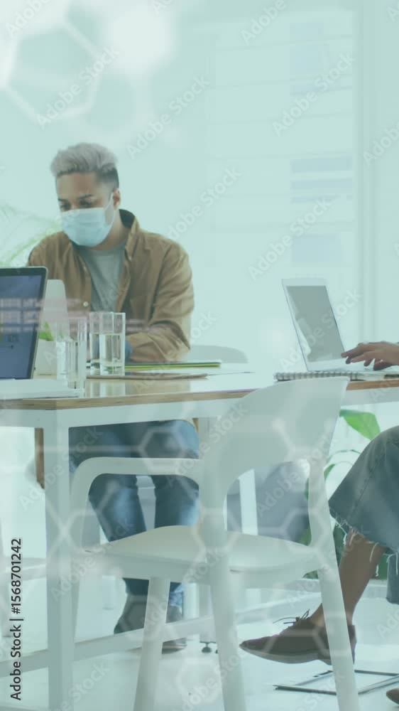 Poster animation of digital interface showing statistics with colleagues in office wearing face masks