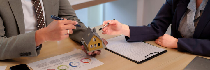 Business people signing real estate contract property deal transaction documents office meeting
