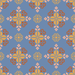 Seamless pattern design. Detailed vector illustration for textile design. Cross stitch pattern. Geometric pattern. Tribal pattern. Pixel art design.