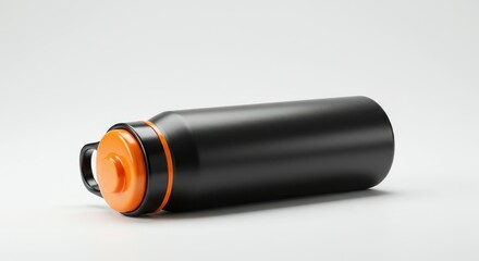 Sleek black water bottle with orange lid, angled on a white surface