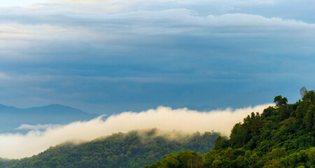 Beautiful Mountain landscape foggy windy mountain range green landscape asian farm. Amazing Landscape mountain green field meadow white cloud blue sky on sunrise. Countryside sunlight heaven scenery