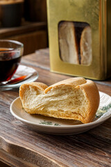 Close-Up of Traditional Biskut Lutut Hard Biscuits on Rustic Background as Classic Malaysian Snack