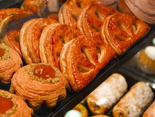 Delicious pastries showcase vibrant flavors and textures in a cozy bakery, tempting visitors with a...