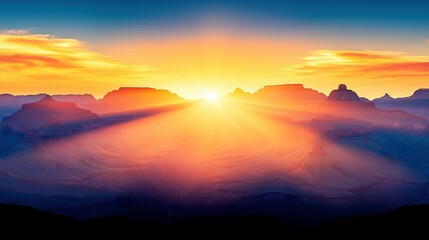 Obraz premium Dramatic sunrise over a vast mountain range.