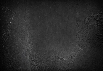 dark cracked asphalt with subtle rough patches and natural wear