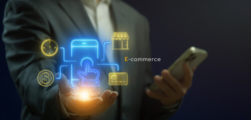 E-commerce, marketing, profit, investment, growth business, economy, finance and success concept. Businessman shows online payment icon in smartphone on virtual screen.