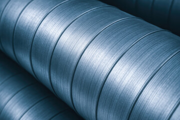 Metal air duct close up in engineering industry with smooth surface and circular design for ventilation and air flow system