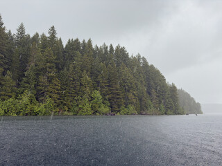A west coast rains storm on a wild untouched lake.