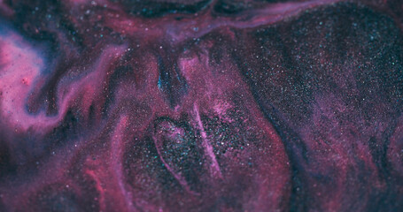 Color mix. Paint background. Defocused purple pink blue liquid droplets flowing dark black stains...