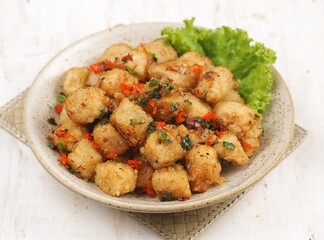 Tahu Cabe Garam. Salted chili tofu is a simple dish made from tofu that is cut and then added with flour and spices