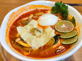 Bowl of Spicy Tom Yum Soup with Egg