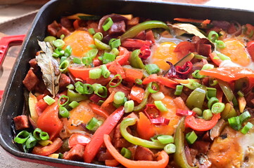 Traditional Czech Lecsó with Sausage, Egg, and Peppers – Close-Up of Rustic One-Pot Summer Meal...