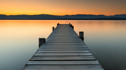 Obraz premium Peaceful sunrise over a lake