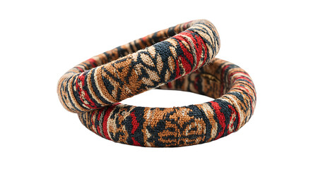 Intricate fabric bracelets layered on white background