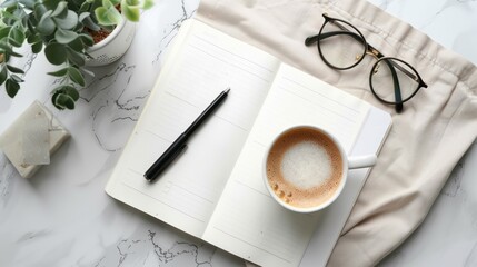 High-angle view of a planner and journal with goal-setting and motivational tools, promoting personal growth and healthy motivation.