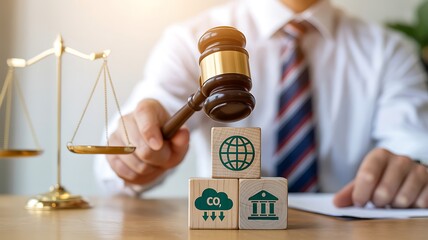 Judge holding gavel over environmental law blocks justice scales