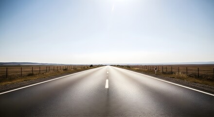 Naklejka premium Empty Highway Stretching into a Clear Sky