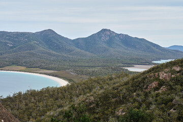 The iconic crescent shaped beach from the Wineglass Bay Lookout - Freycinet Peninsula, Tasmania, Australia