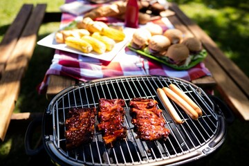 Meat and sausages on barbecue