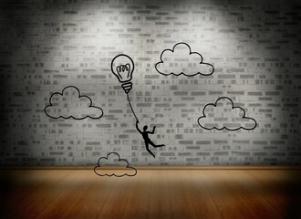 Light bulb graphic in empty grey room