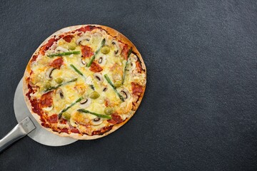 Fresh pizza on stone tray