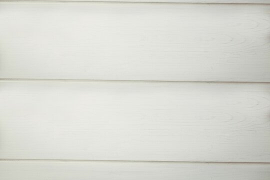 Fototapeta White wooden siding panels are showing wood grain texture and shadow lines in flat design