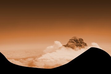 Rocky peak emerging above clouds framing 2 black silhouettes under orange sky in flat design