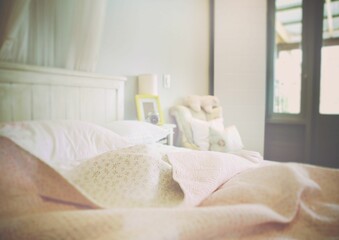 Blanket and pillow on bed