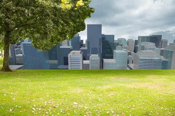 Digital image of grassy landscape with tree and buildings