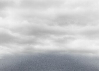 Flat design scene is showing wide textured gray pavement under heavy overcast cloudy sky